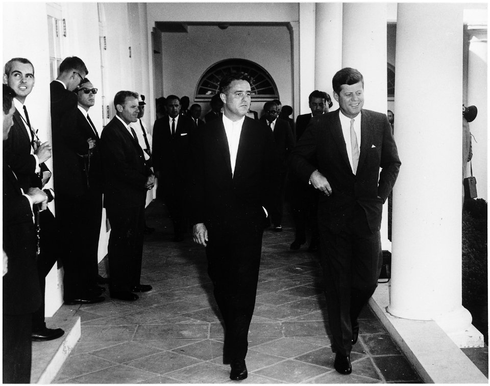 President Kennedy greets Peace Corps Volunteers to Ghana and Tanganyika. President Kennedy, Director of Peace Corps... - NARA - 194174 photo