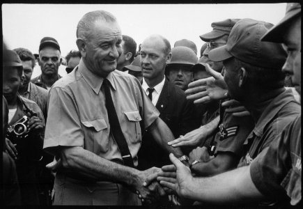 President Lyndon B. Johnson greets American troops in Vietnam, 1966., 1961 - 1974 - NARA - 542077 photo