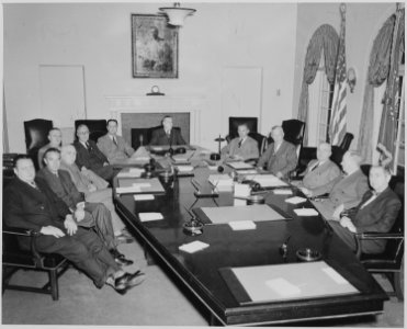 President Truman and his cabinet in the Cabinet Room of the White House. Clockwise at table, Secretary of Interior J.... - NARA - 199649 photo