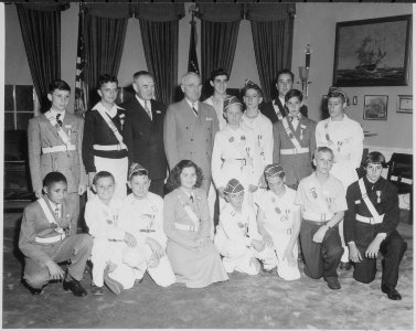 President Truman and Kansas City friend Lou Holland in the oval office with the boys and girls of the Youth Safety... - NARA - 199749
