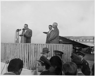 President Truman (far right) greets President Prio Socarras of Cuba at the National Airport in Washington, D. C.... - NARA - 200026