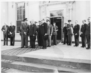 President Truman and Prince Charles of Belgium visiting at the entrance of the White House. - NARA - 199761