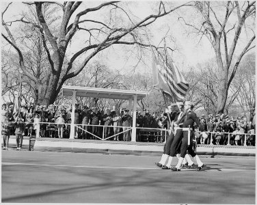 President Truman attends Army Day parade in Washington, D. C. He is viewing the parade from the reviewing stand. - NARA - 199607 photo