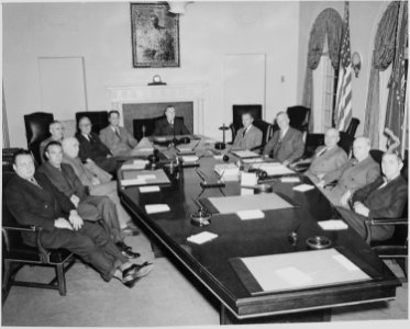 President Truman and his cabinet in the Cabinet Room of the White House. Clockwise around table from left, Secretary... - NARA - 199651