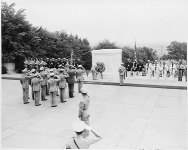President Truman attends a Memorial Day ceremony at Arlington National Cemetery and lays a wreath at the Tomb of the... - NARA - 199728