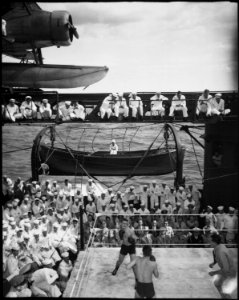 President Truman and party aboard USS AUGUSTA for return trip from the Potsdam Conference. Watching boxing bouts... - NARA - 521002