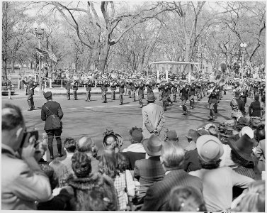 President Truman attends the Army Day parade in Washington, D. C. He is viewing the parade from the reviewing stand. - NARA - 199618