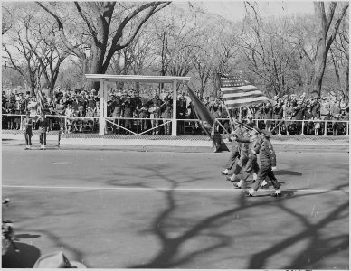 President Truman attends Army Day parade in Washington, D. C. He is watching the parade from the reviewing stand. - NARA - 199620 photo