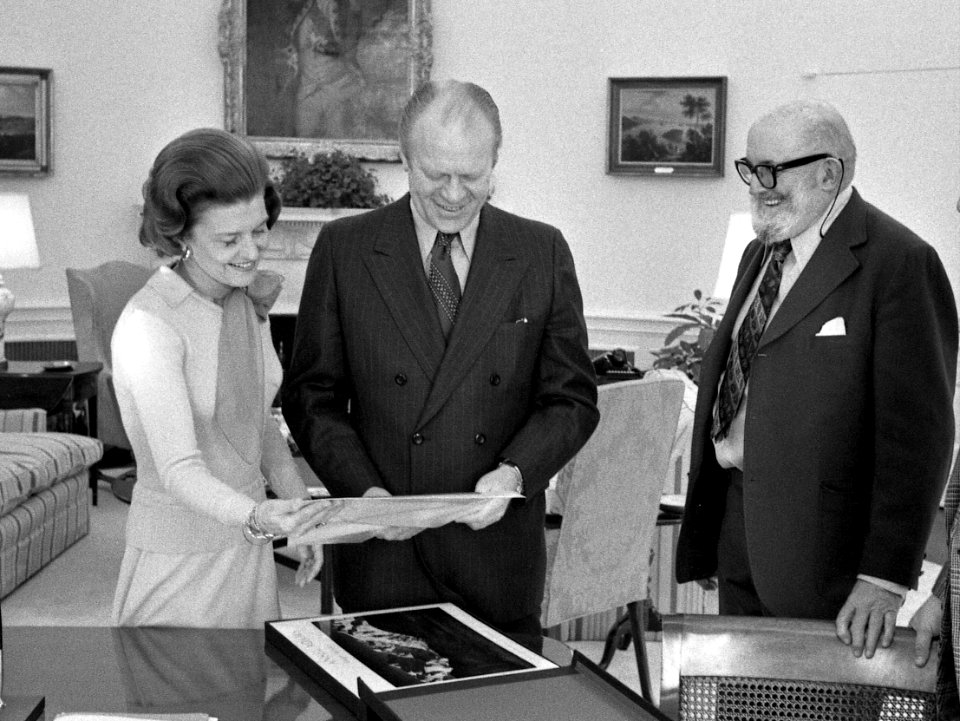 President Gerald R. Ford and First Lady Betty Ford Looking at Photographs in the Oval Office with Ansel Adams