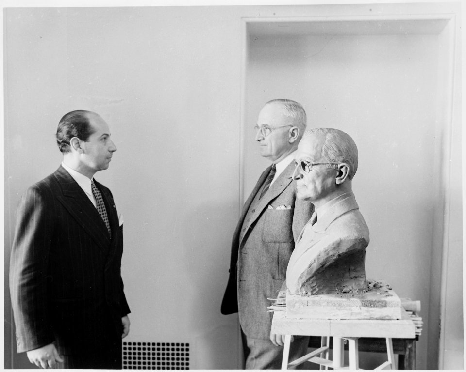 President Truman poses with artist Felix de Weldon and the bust Mr. de Weldon has created. - NARA - 200021