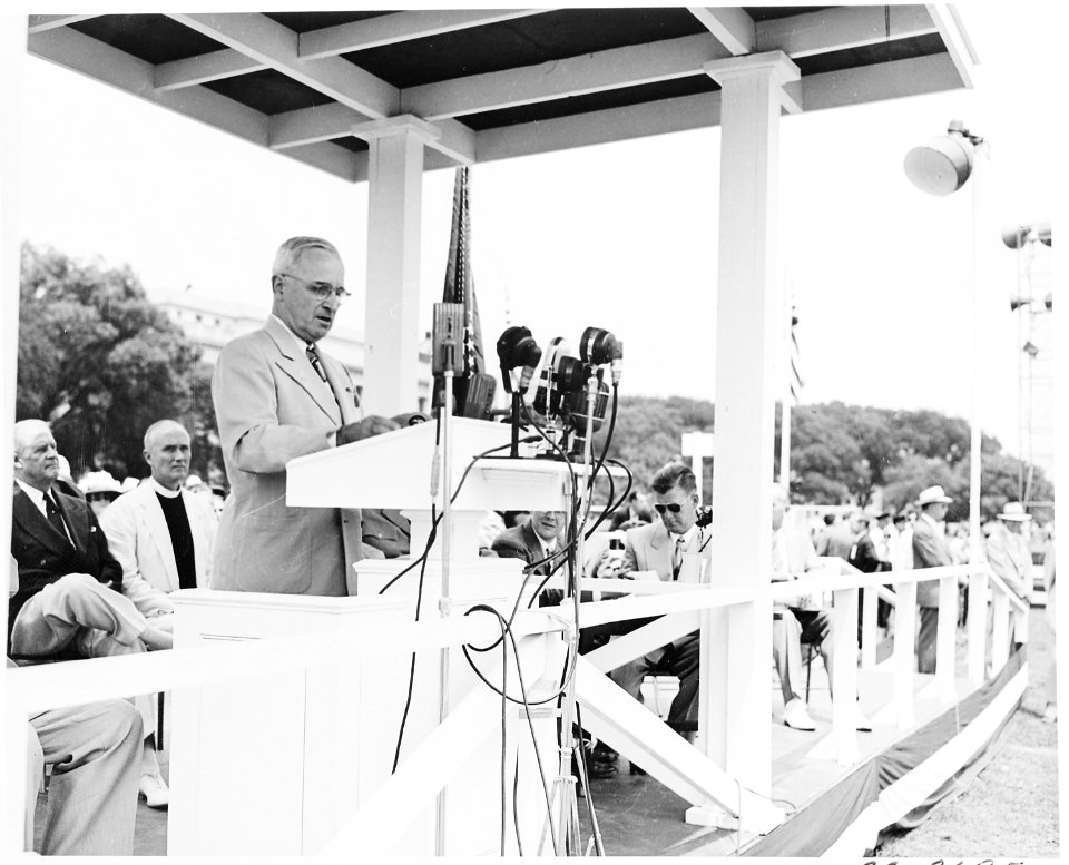President Truman attends ceremonies celebrating the 100th anniversary of the Washington Monument. He is at podium in... - NARA - 199853