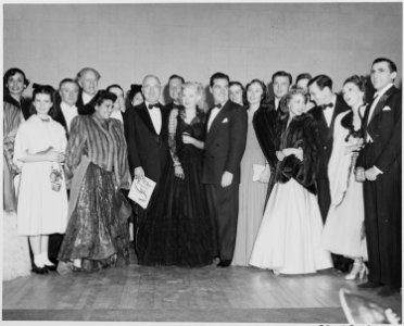 President Truman poses with performers at the inaugural gala at the National Guard Armory in Washington, D. C. Lena... - NARA - 200002