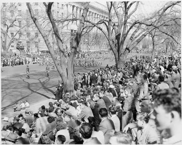 President Truman attends the Army Day parade in Washington, D. C. This is a distance view of the parade. - NARA - 199609 photo