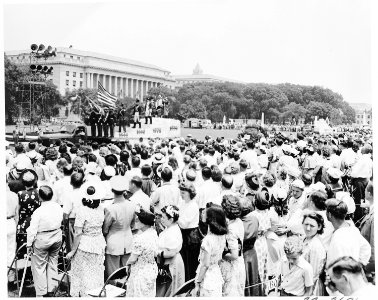 President Truman attends ceremonies celebrating the 100th anniversary of the Washington Monument. This view shows the... - NARA - 199849