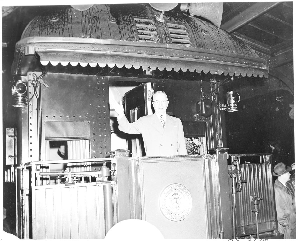 President Truman waves from the rear platform of the presidential train as he is leaving for his western trip to the... - NARA - 199806