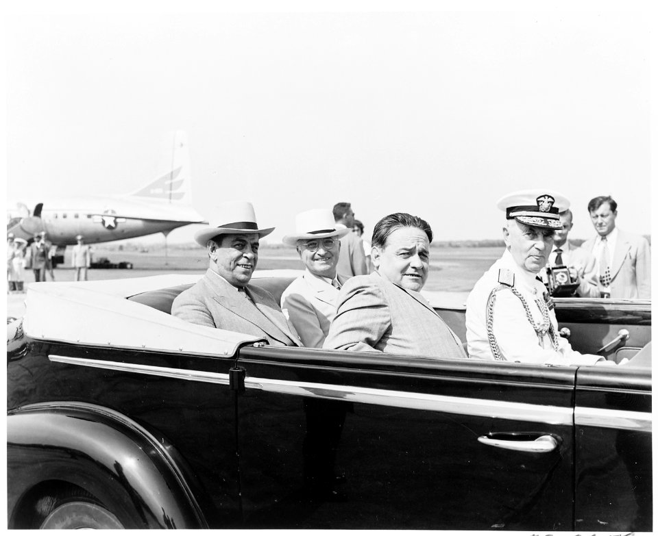 President Truman greets President Romulo Gallegos of Venezuela at the airport upon President Gallegos' arrival in the... - NARA - 199817
