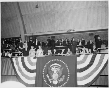 President Truman, Bess, and Margaret Truman standing to acknowledge the crowd at the inaugural gala in the Nationa... - NARA - 200001