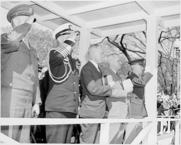 President Truman attends the Army Day parade in Washington, D. C. He is on the reviewing stand, second from the... - NARA - 199619