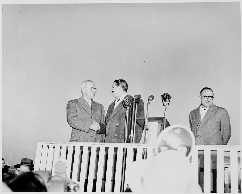President Truman shakes hands with President Prio Socarras of Cuba in ceremonies at National Airport in Washington... - NARA - 200033