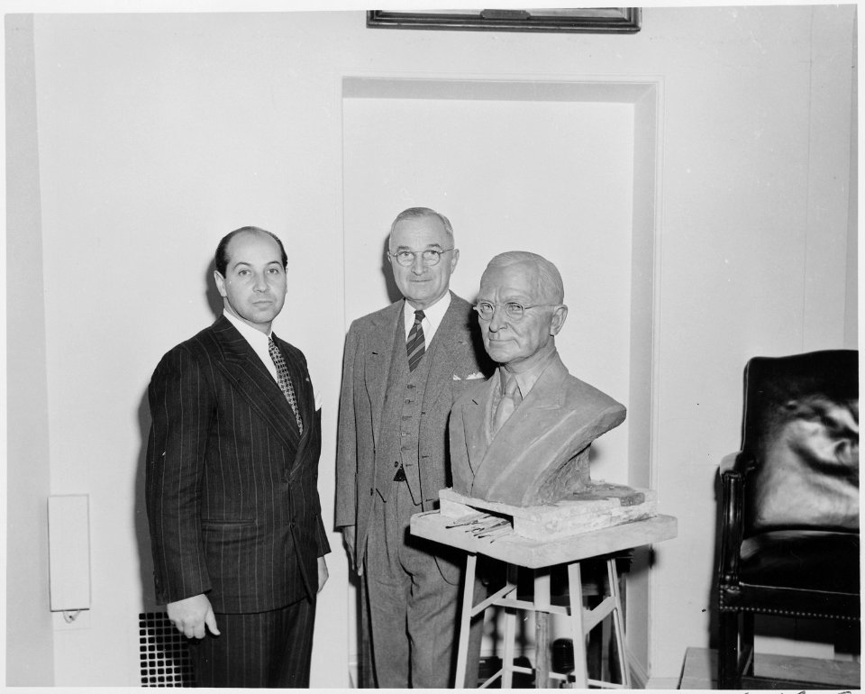 President Truman poses with artist Felix de Weldon and the bust the President has posed for. - NARA - 200019