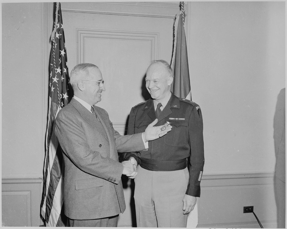 President Truman presents Gen. Dwight Eisenhower with the third Oak Leaf Cluster to the Distinguished Service Medal... - NARA - 199628
