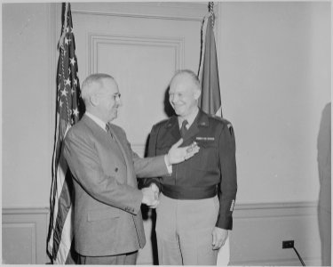 President Truman presents Gen. Dwight Eisenhower with the third Oak Leaf Cluster to the Distinguished Service Medal... - NARA - 199628