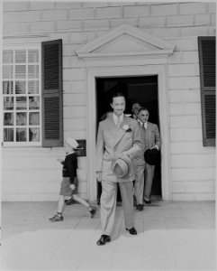 Prince Abdul Ilah of Iraq, walking out the door of George Washington's home at Mt. Vernon, Virginia. - NARA - 199094