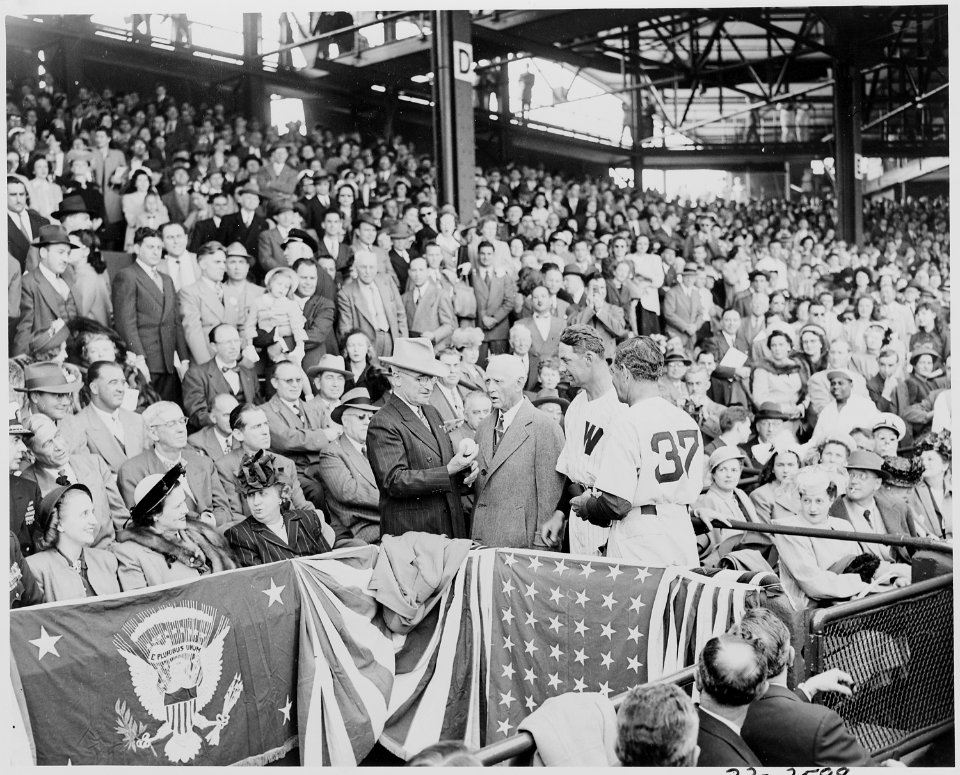 President Truman prepares to throw out the first baseball in the opening game at Griffith Stadium in Washington, D.... - NARA - 199753