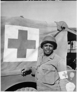 Priavte First Class Warren Capers recommended for Silver Star. With other members of his medical detachment Private... - NARA - 531501
