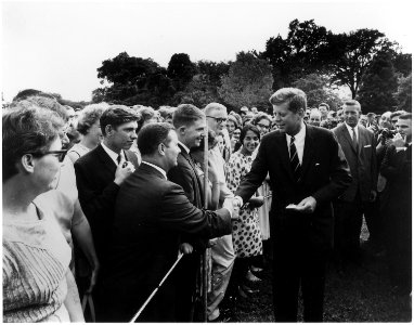 President greets Peace Corps Volunteers. White House, South Lawn. - NARA - 194180 photo