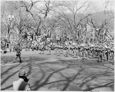 President Truman attends the Army Day parade in Washington, D. C. This view shows a military band marching in the... - NARA - 199602