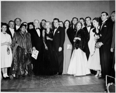 President Truman poses with performers at the inaugural gala held at the National Guard Armory in Washington, D. C.... - NARA - 199989 photo