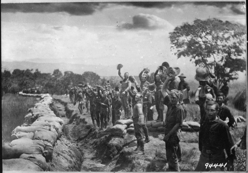 Receiving the news of the surrender of Santiago, Cuba. Scribners Collection., ca. 1900 - 1982 - NARA - 530994
