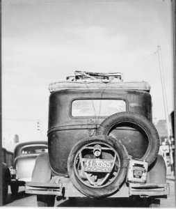 Rear view of an Okie's car, passing through Amarillo, Texas, on its way west, 1941 - NARA - 532820