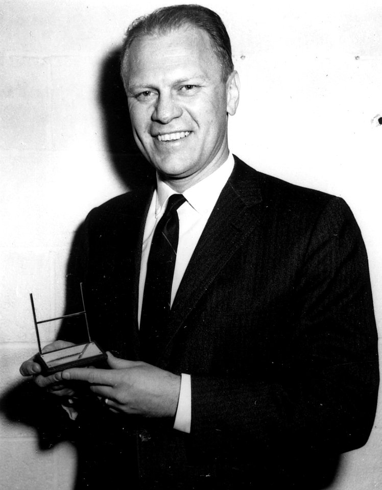 Representative Gerald R. Ford, Jr. with his Sports Illustrated Silver Anniversary Award - NARA - 7064481