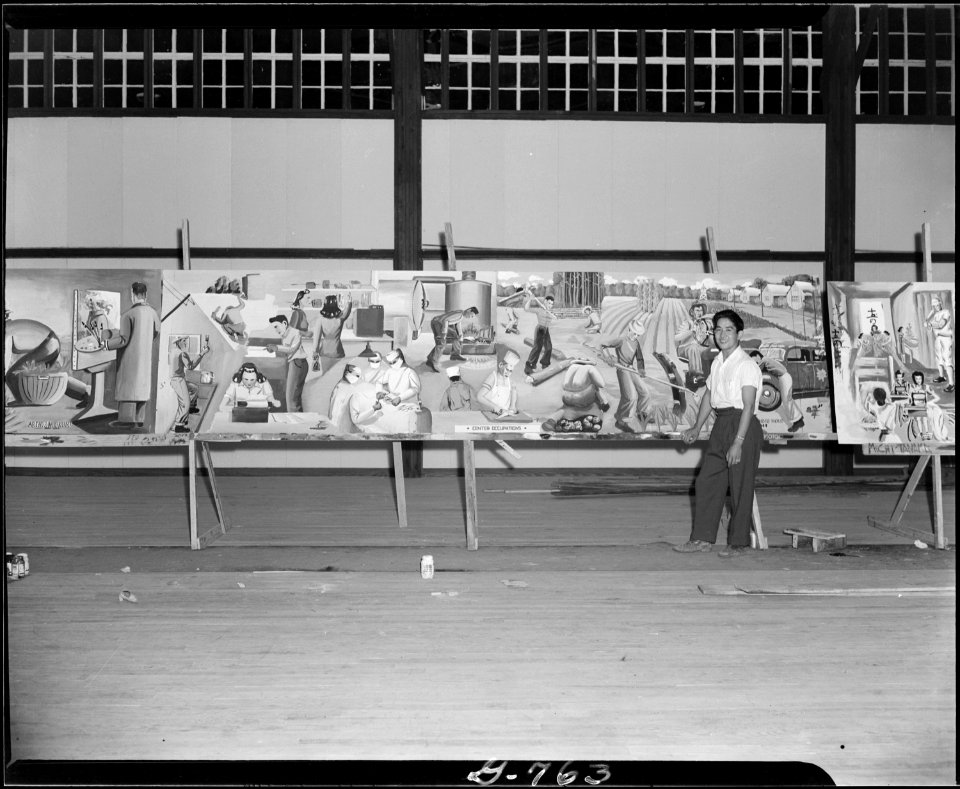 Rohwer Relocation Center, McGehee, Arkansas. Center Occupations, a mural by Mori, who is standin . . . - NARA - 539592