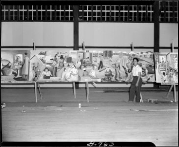 Rohwer Relocation Center, McGehee, Arkansas. Center Occupations, a mural by Mori, who is standin . . . - NARA - 539592
