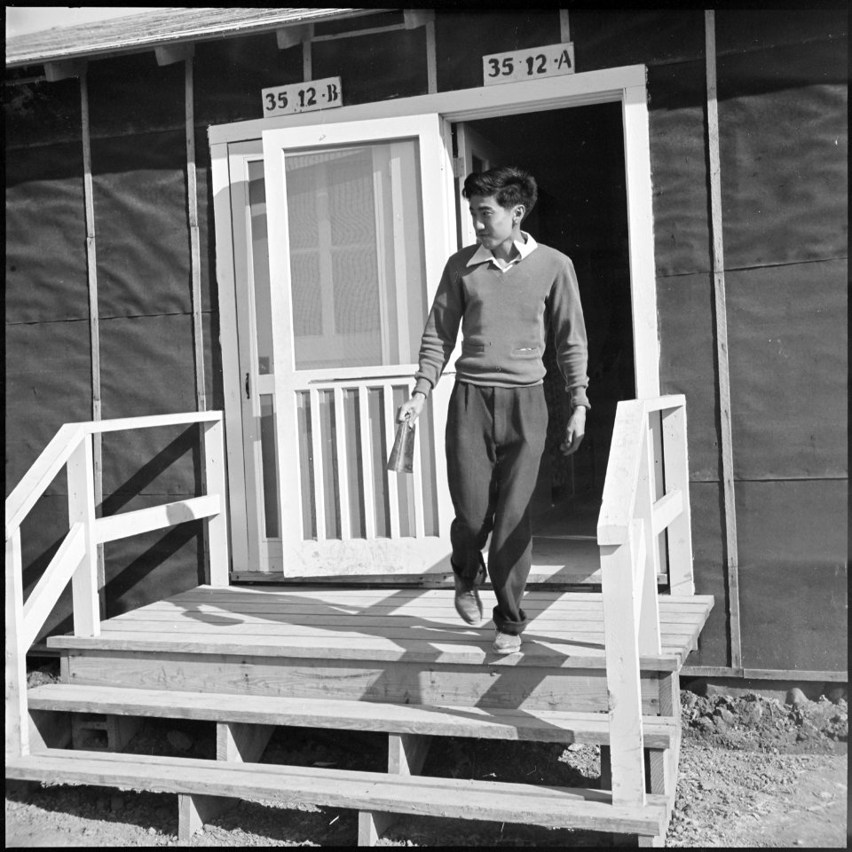 Rohwer Relocation Center, McGehee, Arkansas. A High School office assistant leaves the principal's . . . - NARA - 538933