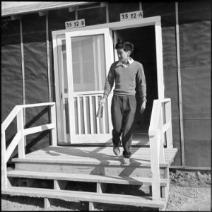 Rohwer Relocation Center, McGehee, Arkansas. A High School office assistant leaves the principal's . . . - NARA - 538933
