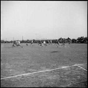Rohwer Relocation Center, McGehee, Arkansas. A football game between teams representing Stockton an . . . - NARA - 538918