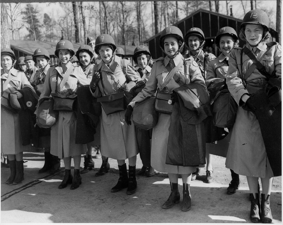 Red Cross workers assembled at the IP, Avenue C and 7th Street, Camp Patrick Henry, left to right, front row, are... - NARA - 542170
