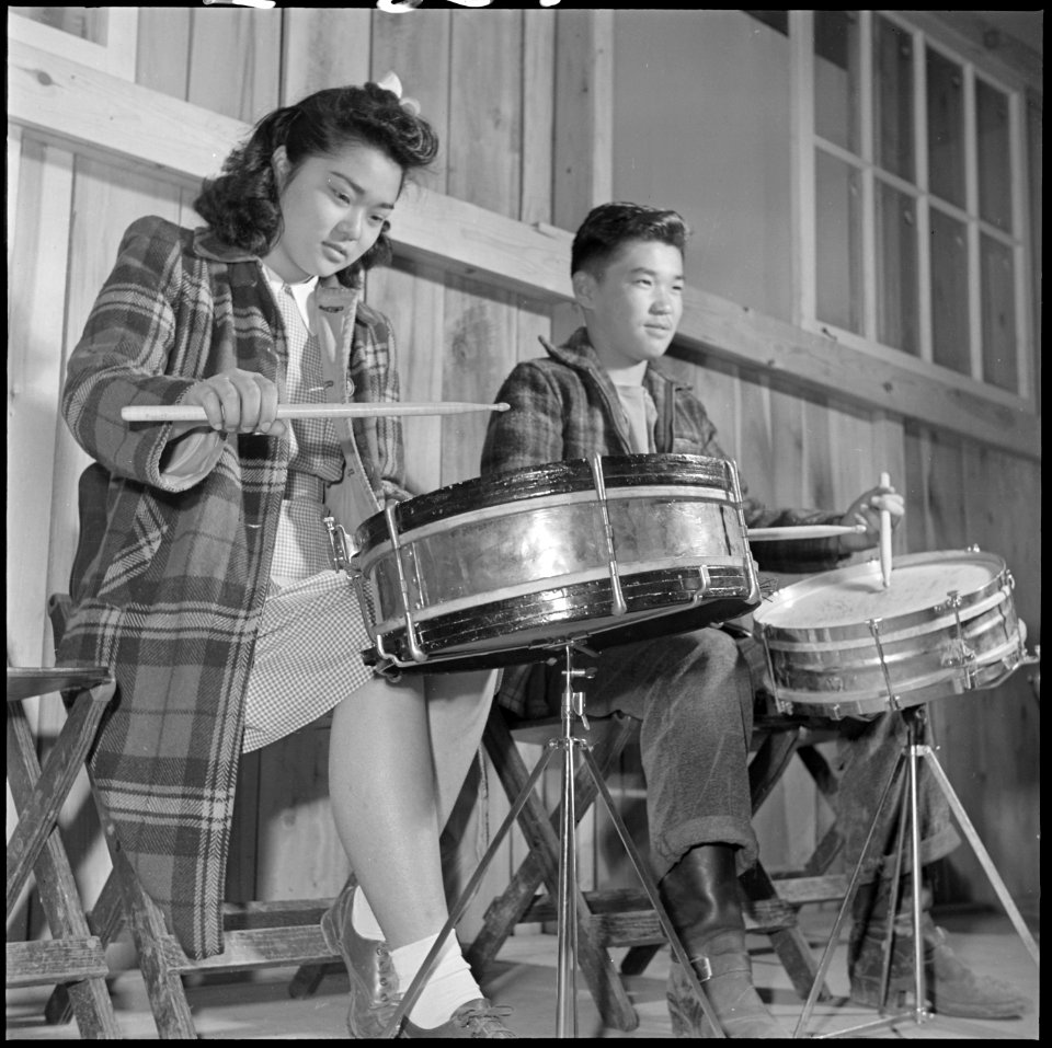 Rohwer Relocation Center, McGehee, Arkansas. A snare drum section of the high school band, in a pr . . . - NARA - 539377