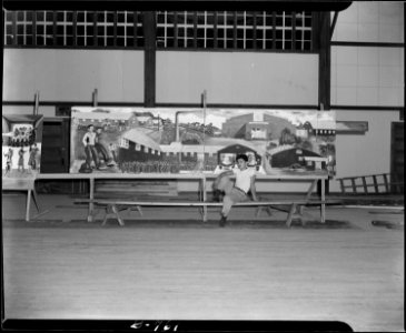 Rohwer Relocation Center, McGehee, Arkansas. Seated in front of this mural depiction The New Home . . . - NARA - 539590