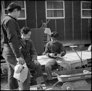 Rohwer Relocation Center, McGehee, Arkansas. Many of the evacuees are very skillful woodcravers. T . . . - NARA - 537383 photo
