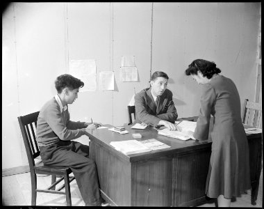 Rohwer Relocation Center, McGehee, Arkansas. Principal William M. Beasley and his office staff, Nob . . . - NARA - 538967