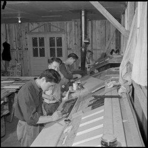 Rohwer Relocation Center, McGehee, Arkansas. In the sign shop, at the Rohwer Center, experienced a . . . - NARA - 539381 photo