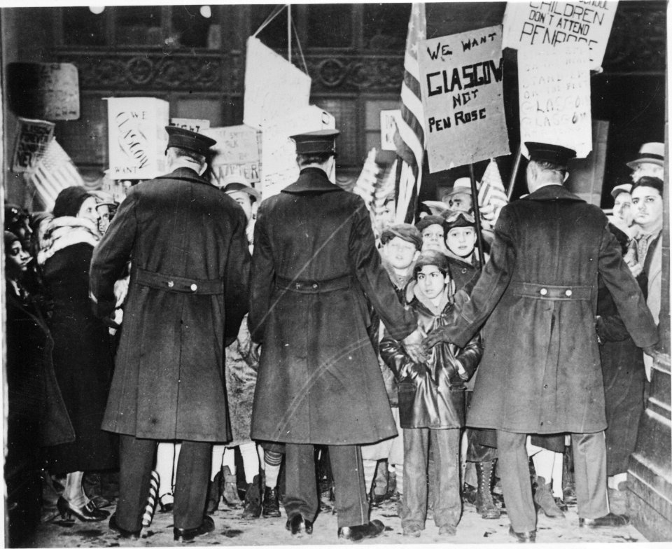 Saint Louis children and their parents behind a police line during their protest against transfer to a school open to bl - NARA - 541878