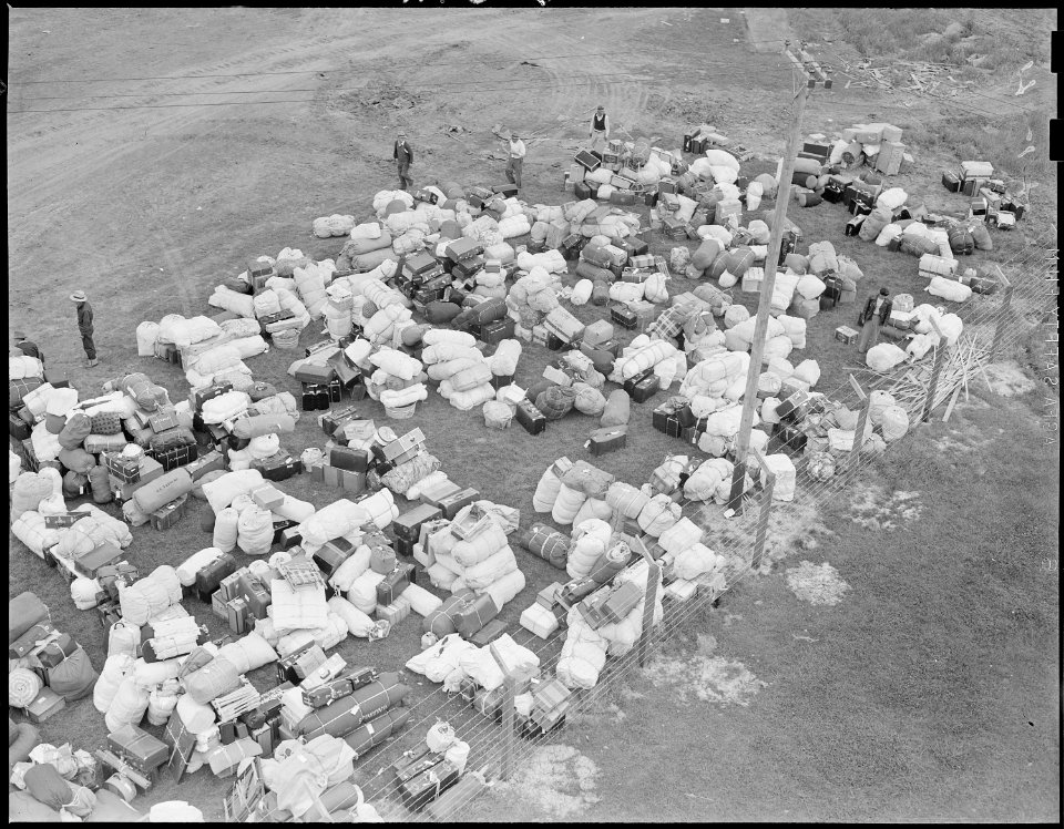 Salinas Assembly center, Salinas, California. Persons of Japanese ancestry are shown with their lug . . . - NARA - 536168