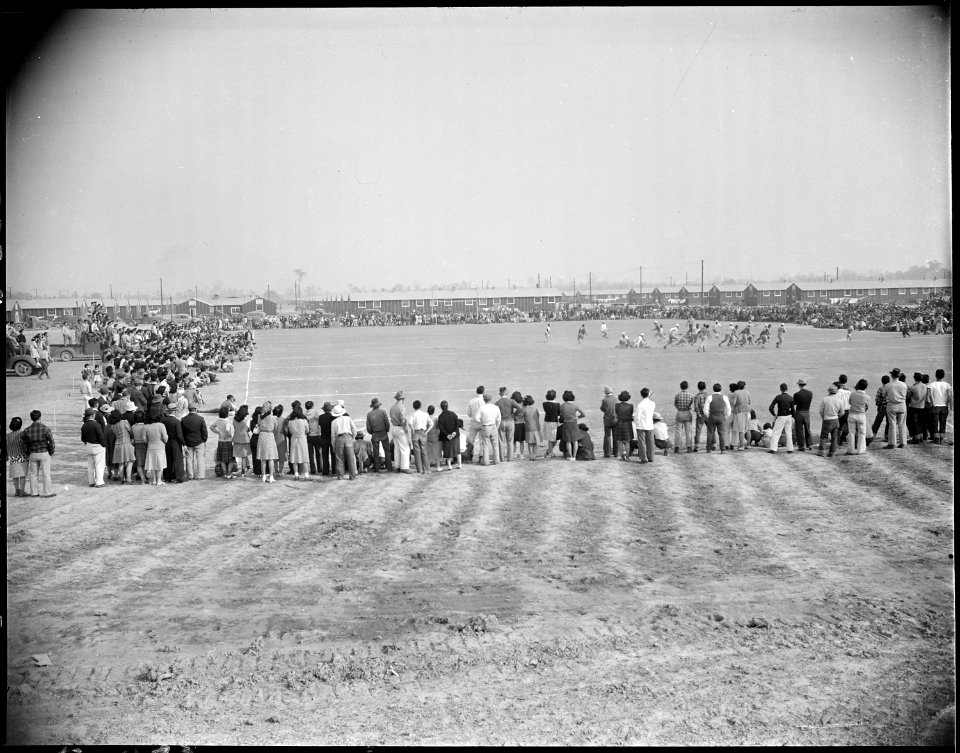 Rohwer Relocation Center, McGehee, Arkansas. A view of the football crowd at a game between teams r . . . - NARA - 538971