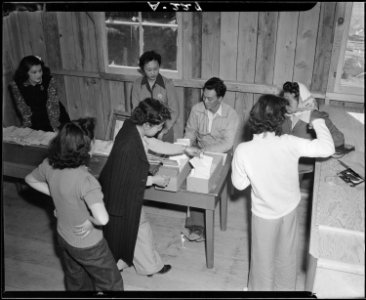 Salinas, California. Postal service is established when evacuees of Japanese descent arrive at this . . . - NARA - 536176